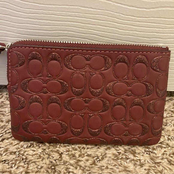 Like new, Coach wristlet - Picture 3 of 7
